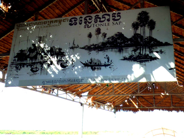 Signage at Tonle Sap boat pier, Siem Reap, Cambodia