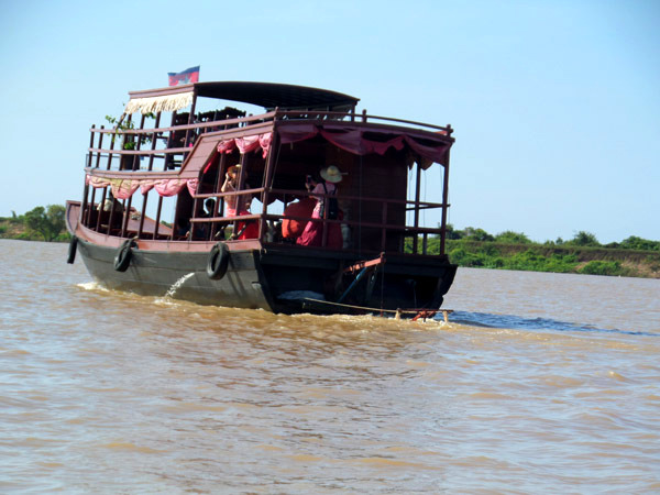 tourist boat on Tonle Sap Lake, Cambodia