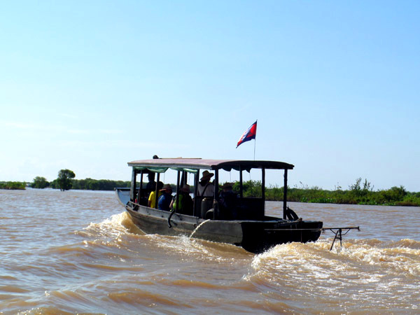 tourist boat on Tonle Sap Lake, Cambodia