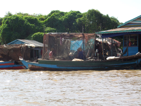 fishermen at Tonle Sap, Cambodia