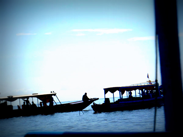 silhouettes on the Tonle Sap Lake, Cambodia