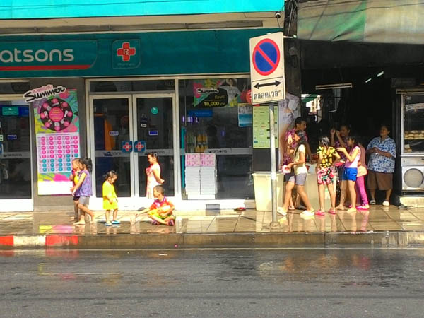 family celebrating Thai New Year or Songkran